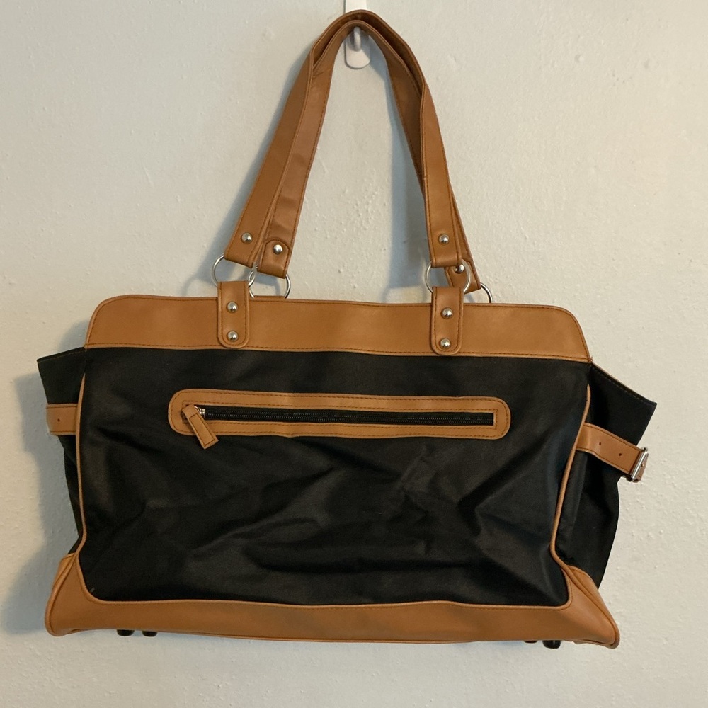 Barr & Barr (Exclusively for Bloomingdale’s). Black Bag with Tan Trim.